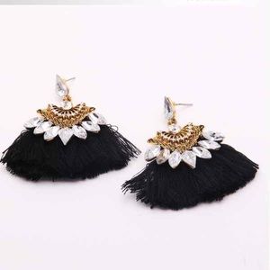 Gorgeous light tassel earrings with rhinestones